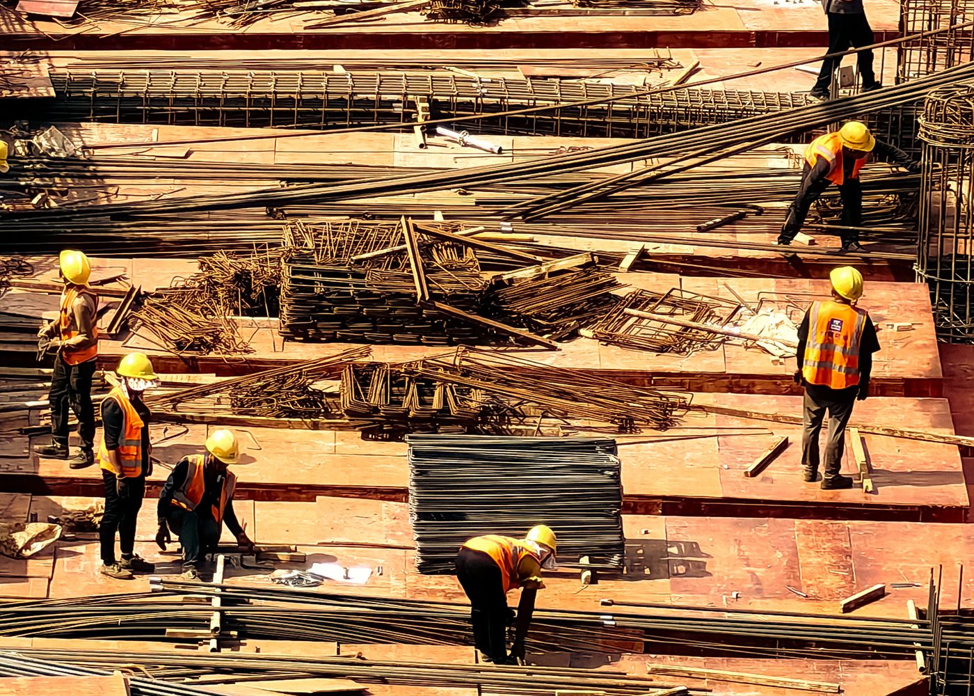 A crew working together on a large construction site